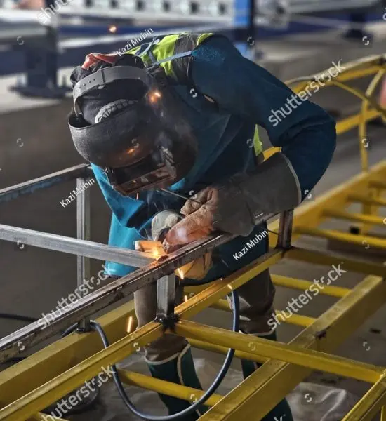 Welder working on a steel structure